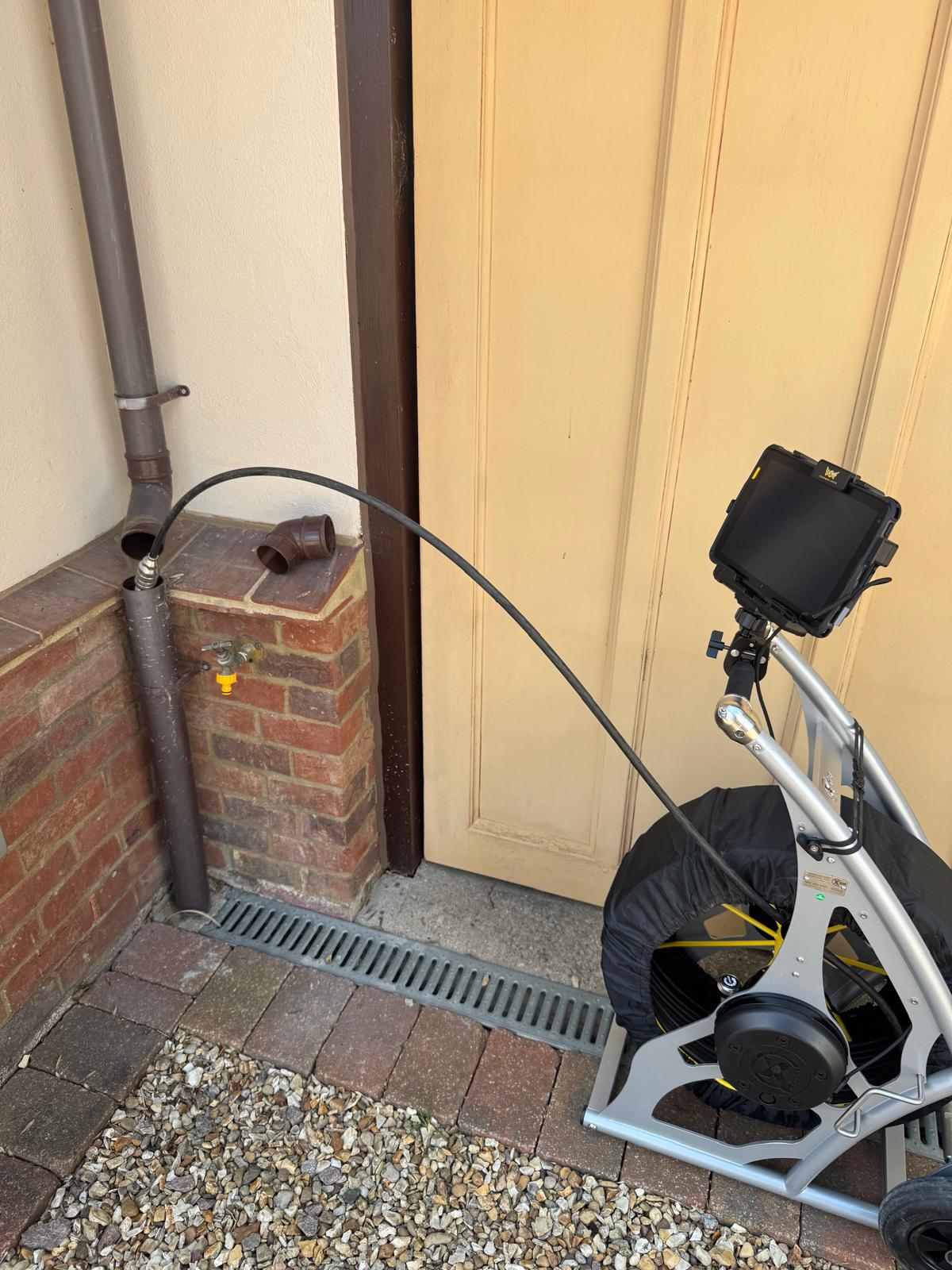 CCTV camera fed into downpipe access point
