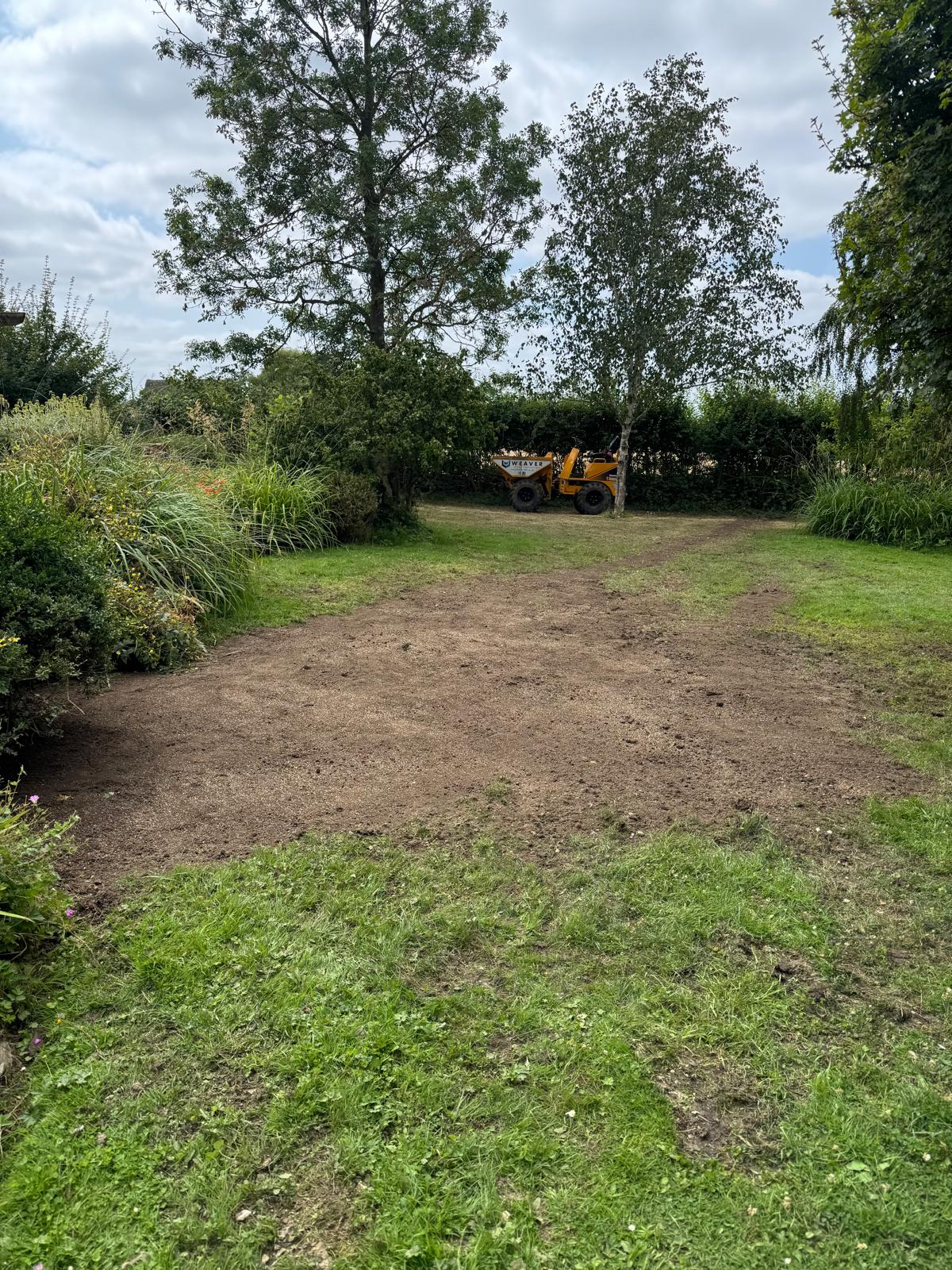 Reinstated and levelled garden after drainage works, ready for seeding